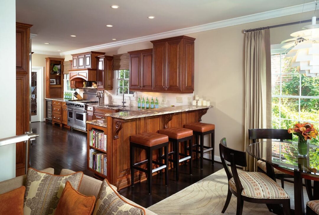 Gallery image of a kitchen with a dining area and bar stools in Norcross, GA
